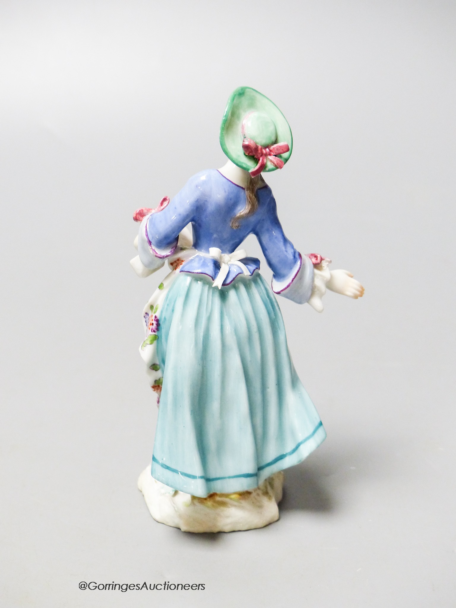 A Meissen figure of a dancing lady, 18th/19th century, height 13cm